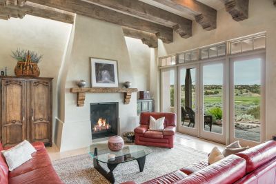Great Room with grand Fireplace and View to the Golf Course