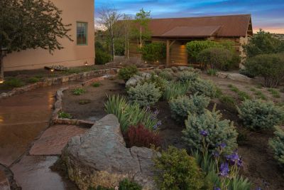 Night View of Landscaped Front Gardens and Flagstone Path to Guest Casita