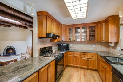 Updated Kitchen with Granite Counters and Cherry Cabinets