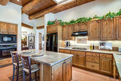 Kitchen with alder cabinets and large center island