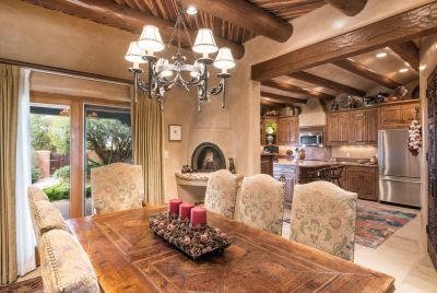 Split Cedar Latillas & Elevated Kiva Fireplace in Dining Room