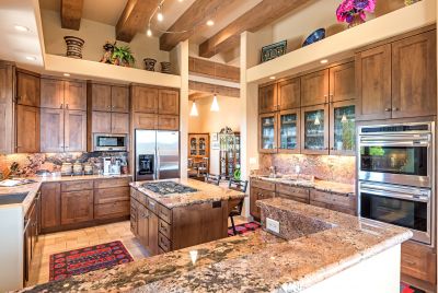 Center Island Kitchen - Handsome cabinetry & granitecounters. Wolf cook top & double ovens. 2 dishwashers.