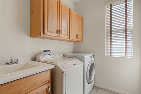 Laundry Room, with Washer, Dryer, Sink and Window