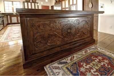 Hand carved bar copied from a 1524 Spanish chest