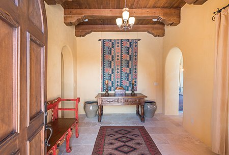 Entry Foyer. Solid Mesquite entry doors and wall gates. 
