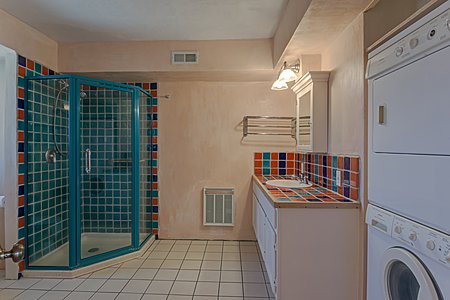 Shower and Sink in Upstairs Bath with Washer and Dryer