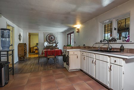 Kitchen with look over to Dining Room