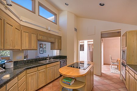 Kitchen with large pass-through to the Family Room