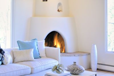 Upstairs living room with kiva fireplace 