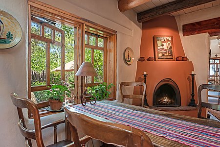 View of Kiva Fireplace in Dining Room