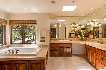 Spacious marble master bath nestled in the pinons...