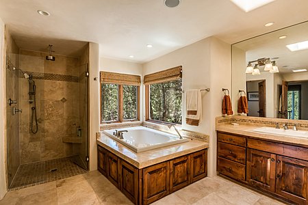 Master bath in a wooded setting