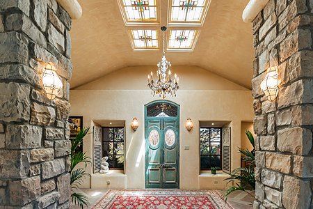 Main house entry with stain glass ceiling detail 