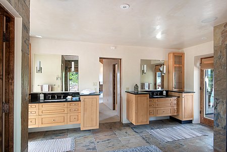 Master Bathroom - double vanities and access to South and East patio spaces