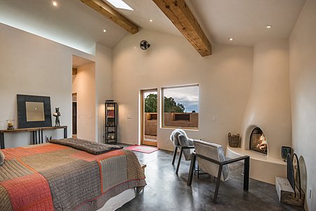 Master Bedroom Suite with corner kiva fireplace