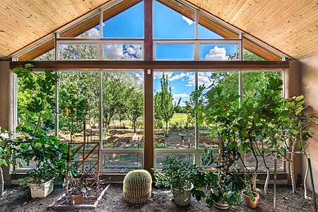 Solarium with Views to the Vegetable garden and Hay Field