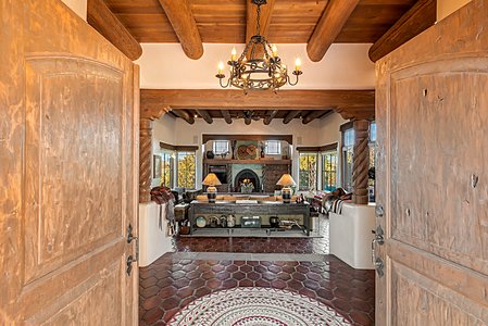Custom Carved Doors Welcome You to 27 Wildhorse