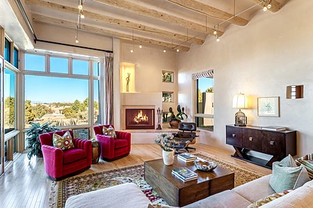 Gracious Living Room with Fireplace and expansive views to the Jemez Range