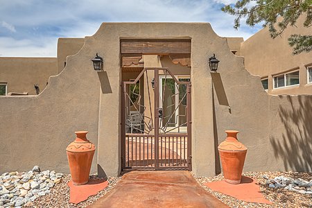 Gated entry welcomes guests to the interior patio 