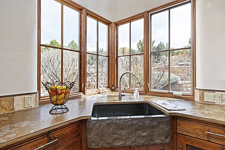 Kitchen with stone apron sink
