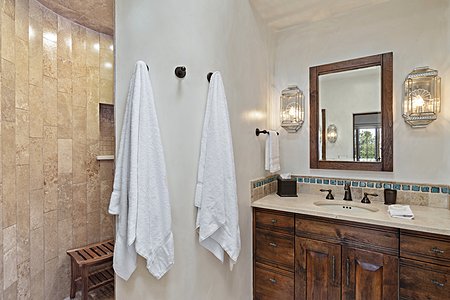 En suite master bathroom curved shower