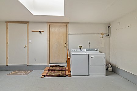 Two car garage with washer dryer