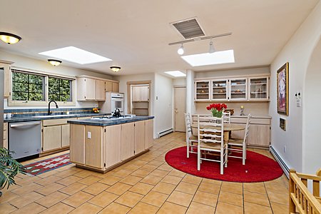 Kitchen with informal dining area on right