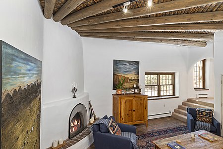 Watch TV with a fire under these gorgeous ceilings!