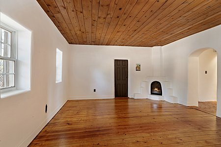 Living Room, #1 wood plank floors kiva fireplace