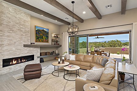 Gathering/Living Room with Audio Visual Built-Ins; Multi-panel Sliding Glass Door to Back Patio; Sangre de Cristo Mountain Views                                