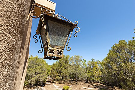  Whimsical Light Sconce on the Master Bedroom Patio 
