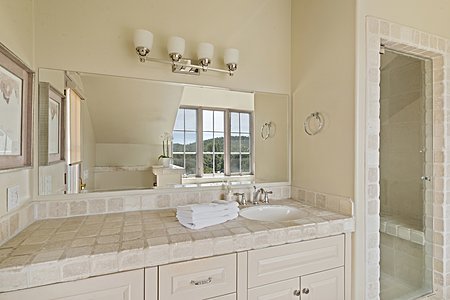 En suite master bath vanity and steam shower