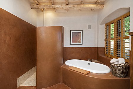 Walk-in shower and soaking tub in the owners bathroom
