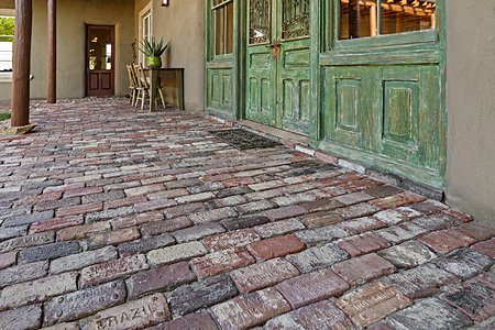Custom bricks and doors of interior courtyard at Main house