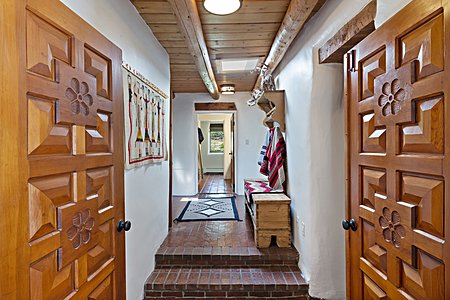 Hallway looking toward guest wing and shared bath