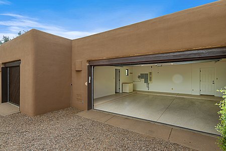 Spacious 3-Car Garage w/ separate 3rd Bay for use as an Art Studio or Workshop