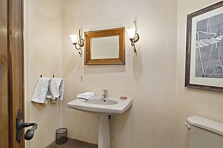 Powder Room discretely located off the Hallway near the Great Room-Dining  & Kitchen