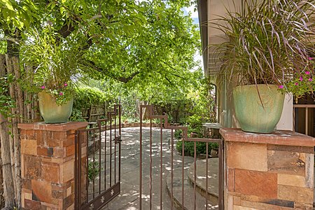 Main Entry to very private front patio & gardens
