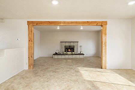 Natural wood frame accent with updated LED lighting create an inviting space.