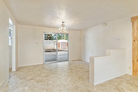 The dining space gives access to the back patio.