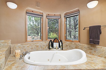 Soaking and jetted tub in master bathroom