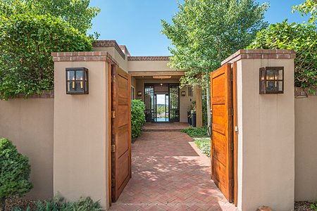 Magnificent Entry through the Courtyard into the Foyer with Panoramic Views Beyond