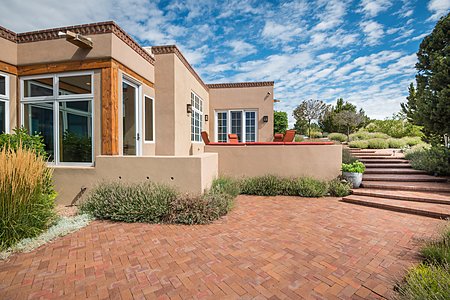 Brick Patios and Pathways Surround the Residence...