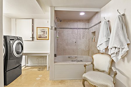 Lower level suite with bathroom including washer/dryer
