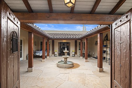 Interior courtyard with living room in distance