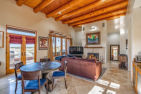 Dining & Living Areas take in the Golf & Mountain views