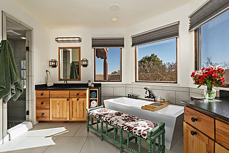 Owners' Bath includes a Separate Walk-in Shower and Kiva Fireplace