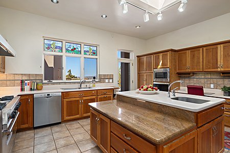 Kitchen with Island and Stained Glass Windows