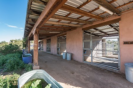 Stables: 4 Horse Stalls w/ uncovered & covered space for each