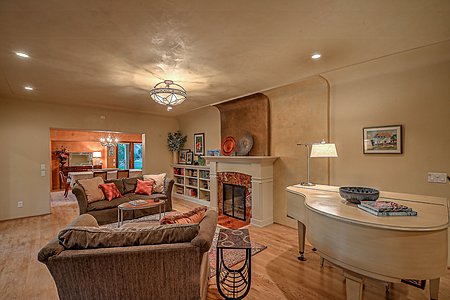 Formal living room enjoys natural light and elegant features 